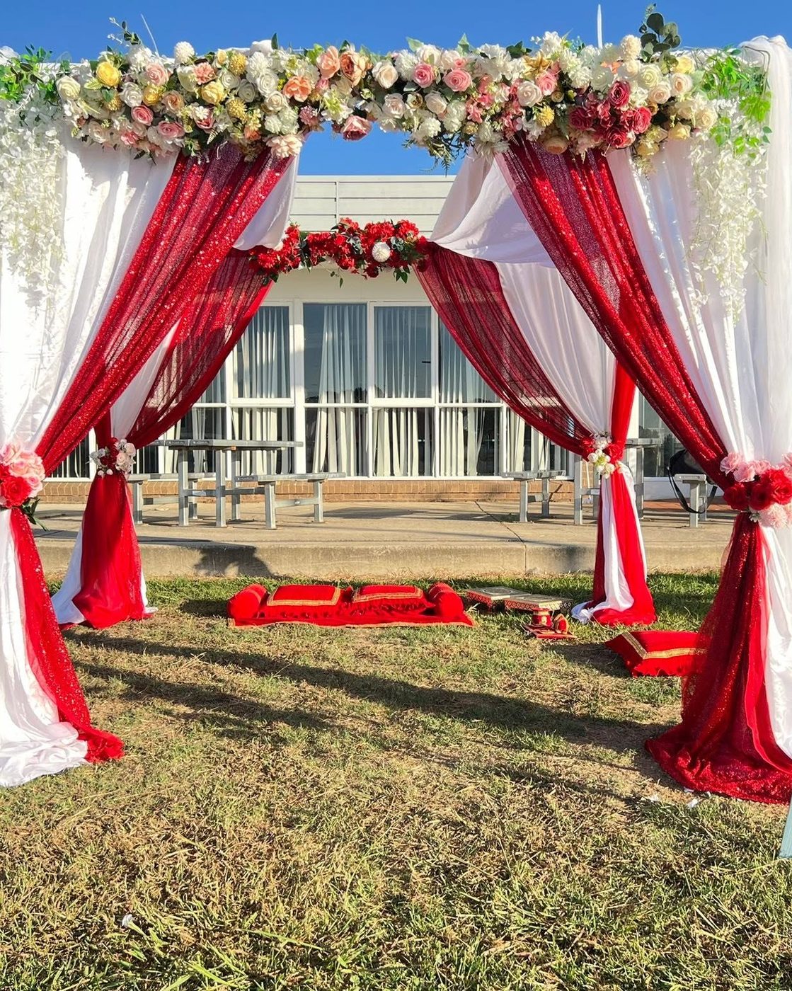 Elegantly styled event reception with floral centrepieces and soft lighting